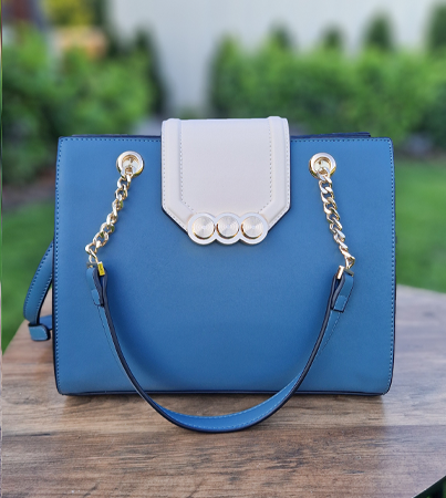 Menbur torebka niebieską z białą klapką